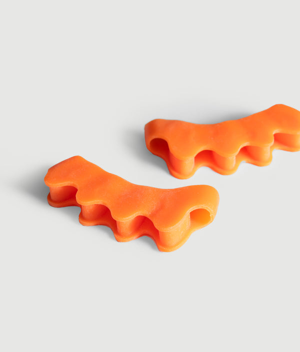 GYMKUMA silicone toe spacers worn between the toes to improve foot mobility